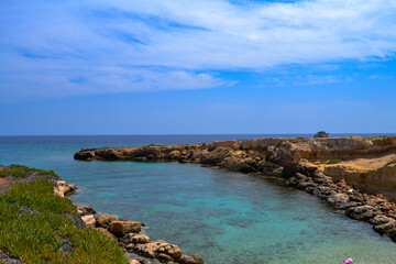 Fototapeta na wymiar Sea shore. Rocky shore. Rest at the sea. Vacation. Beach. Cyprus.