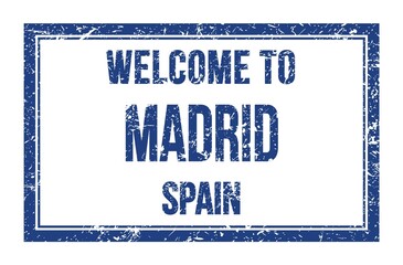 WELCOME TO MADRID - SPAIN, words written on blue rectangle stamp