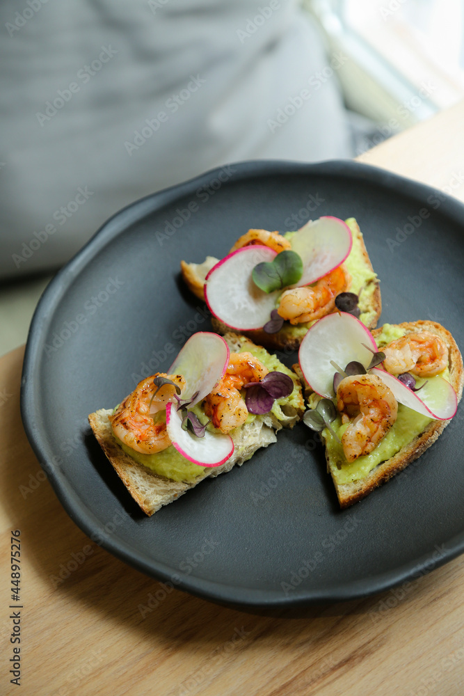 Sticker Bruschetta with shrimps and avocado