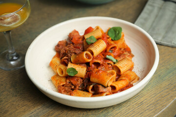Pasta with braised duck and tomatoes