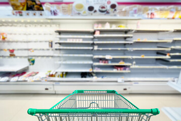 Empty shelves in supermarket store due to novel coronavirus covid-19 outbreak panic in thailand.