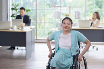Smiling young Asian woman office worker in wheelchair look at camera, disabled people working with...