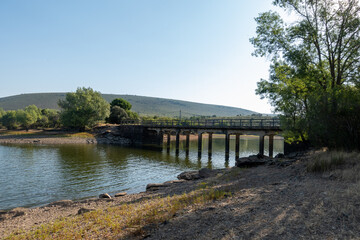 wooden bridge over the lake
