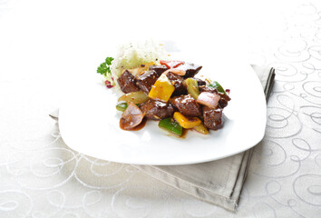 stir fried meat pork, beef, lamb with bell pepper in black pepper sauce in white background asian halal menu