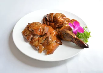 Rolgordijnen roasted bbq golden Beijing peking whole duck meat in white background asian halal menu © perfectloop