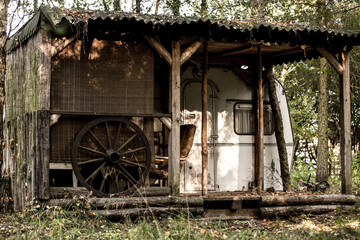 An old abandoned caravan trailer in the woods changed to a house