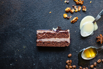 piece of cake chocolate cream nuts, coffee syrup flavor spices, honey, ganache sweet dessert holiday treat meal snack copy space food background rustic