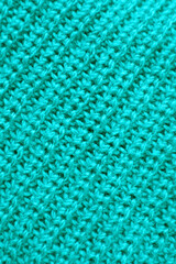 Closeup the Texture of Turquoise Blue Knitted Wool Fabric in Diagonal Patterns	