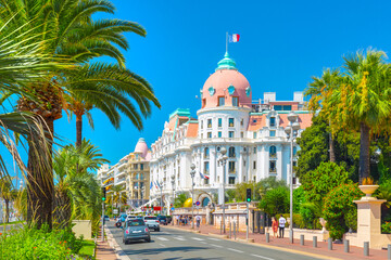 Fototapeta na wymiar Promenade des Anglais in Nice, France. Nice is a popular Mediterranean tourist destination, attracting 4 million visitors each year