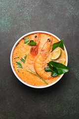 Tom Yam kung spicy Thai soup with  prawn and coconut milk. Traditional  asian spicy coconut milk soup