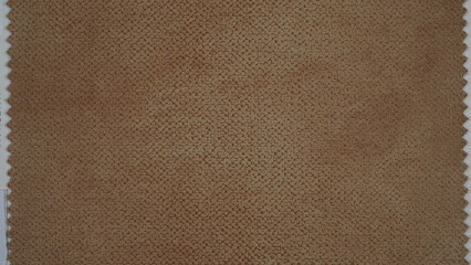 Fototapeta na wymiar brown textured fabric on leather