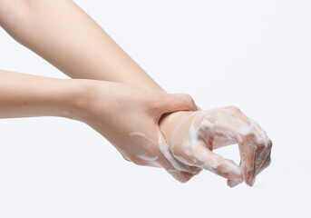 women washing hands on white background.