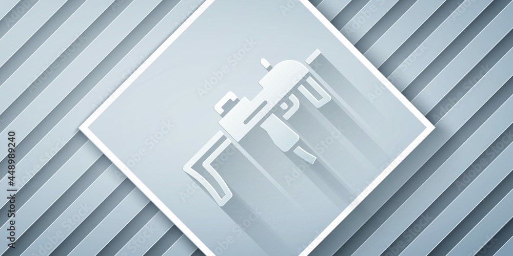 Poster paper cut mp9 submachine gun icon isolated on grey background. automatic weapon. paper art style. ve