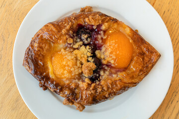 Danish pastry on a plate top view