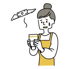 貯金通帳を見てがっかりしている女性