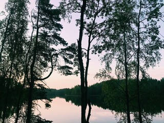 Obraz premium sunset on the river