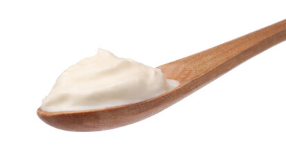 Fototapeta na wymiar Delicious sour cream in wooden spoon on white background