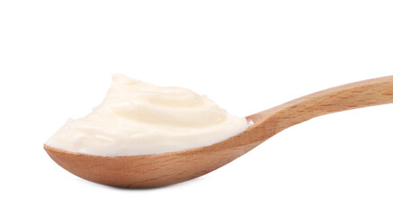Delicious sour cream in wooden spoon on white background