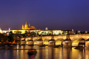 Fototapeta na wymiar Charles bridge and cityscape at sunset, Prague, Czech Republic