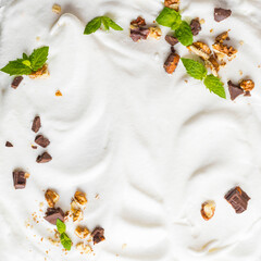 Whipped cream of egg whites with chocolate, nutmeg and mint.