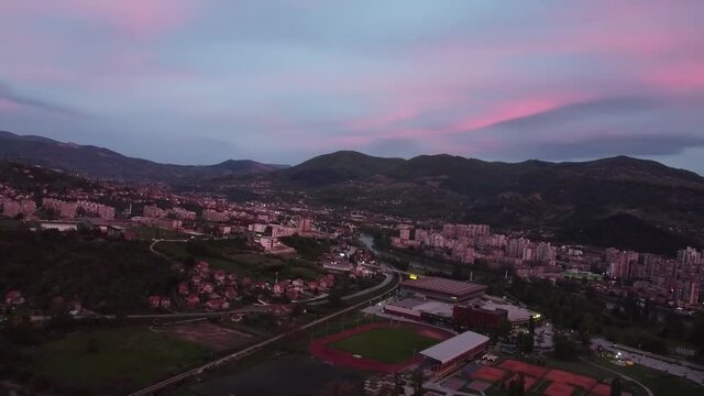 An aerial shot of the city of Zenica at a time when fireworks mark the end of fasting