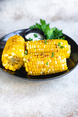 corncob grilled corn fast food meal snack copy space background rustic top view keto or paleo diet veggie vegan or vegetarian food 