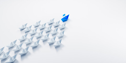 Arrow shaped group of paper boats with blue leader going in same direction - 3D illustration