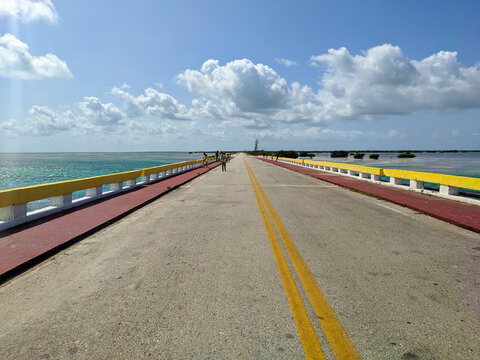 Cayo Coco, Cuba, 16 may 2021: Tourists cross the Hemingway Bridge on foot and admire the sea views. The Hemingway Bridge connects the Cuban islands of Cayo Coco and Cayo Guillermo.