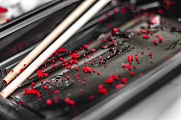 leftovers from a portion of tobiko caviar rolls show the delicious taste of Japanese cuisine