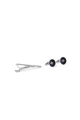 Subject shot of steel tieclip and cufflinks with textile surface with floral pattern. Stylish...