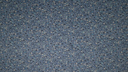blue jeans texture with black and golden dots on fabric