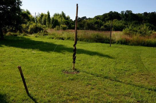 playing net on the lawn football field, badminton, tennis court, in the countryside at the cottage in the school in the yard, forest nursery for children, summer camp in the mountains
