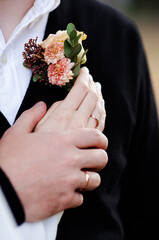 bride and groom holding hands
