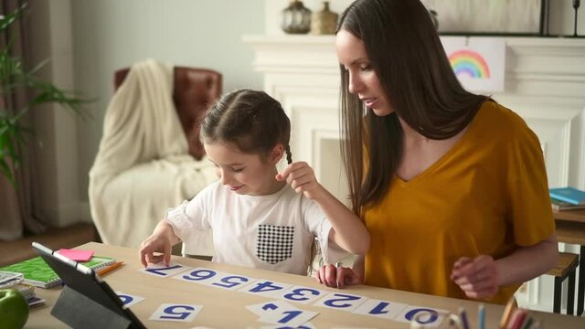 Home education for children girl with mother learn digits Spbd