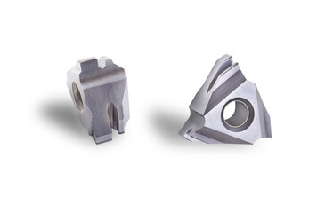 metalworking carbide insert triangle. special tool. front and side view photo. Used auto turning...
