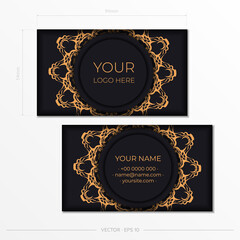 Black business cards with luxurious gold ornaments. Business card design with vintage patterns.