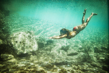 Obraz na płótnie Canvas Woman Enjoying Deep Waters