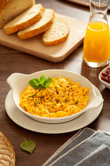 Plate of organic scrambled eggs for breakfast