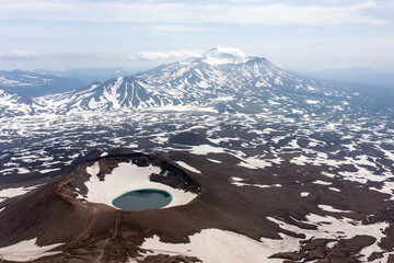 Gorely Volcano crater lake with Mutnovsky Volcano on the background. Kamchatka, Russia © Ravil Sayfullin