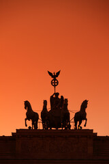Fototapeta na wymiar The Brandenburg Gate quadriga at sunset, Berlin, Germany