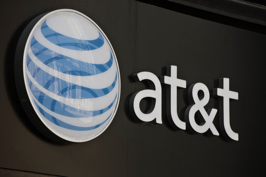 AT&T cell phone retail store. AT&T is spinning off its media assets to concentrate on cell phone, mobility and high speed internet.