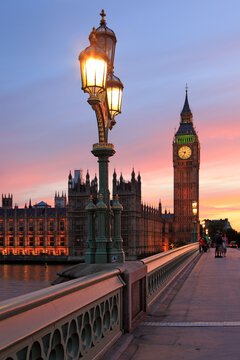 Palace of Westminster at dusk, viewed from across the river Thames, London, UK