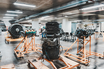 Aircraft turbo engine on display in aircraft maintenance hanger for studying and training