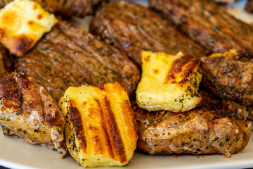 Grilled steaks meat and halloumi cheese