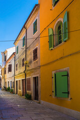 Fototapeta na wymiar A quiet back street in the historic medieval coastal town of Porec in Istria, Croatia 