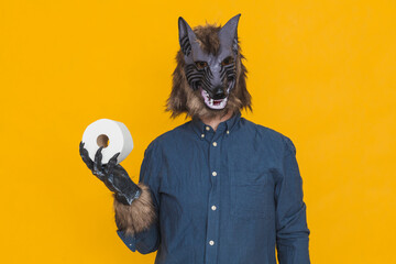 A werewolf with a toilet paper roll