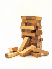 Table game Jenga made of wooden blocks isolated on white background