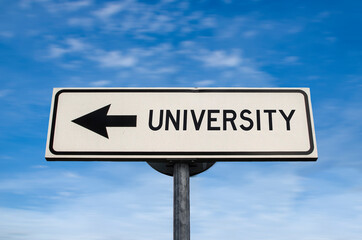 Fototapeta premium University road sign, arrow on blue sky background. One way blank road sign with copy space. Arrow on a pole pointing in one direction.