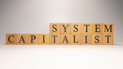 The name Capitalist system was created from wooden letter cubes.