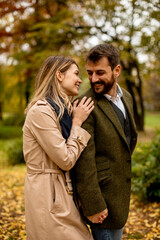 Young couple in the autumn park